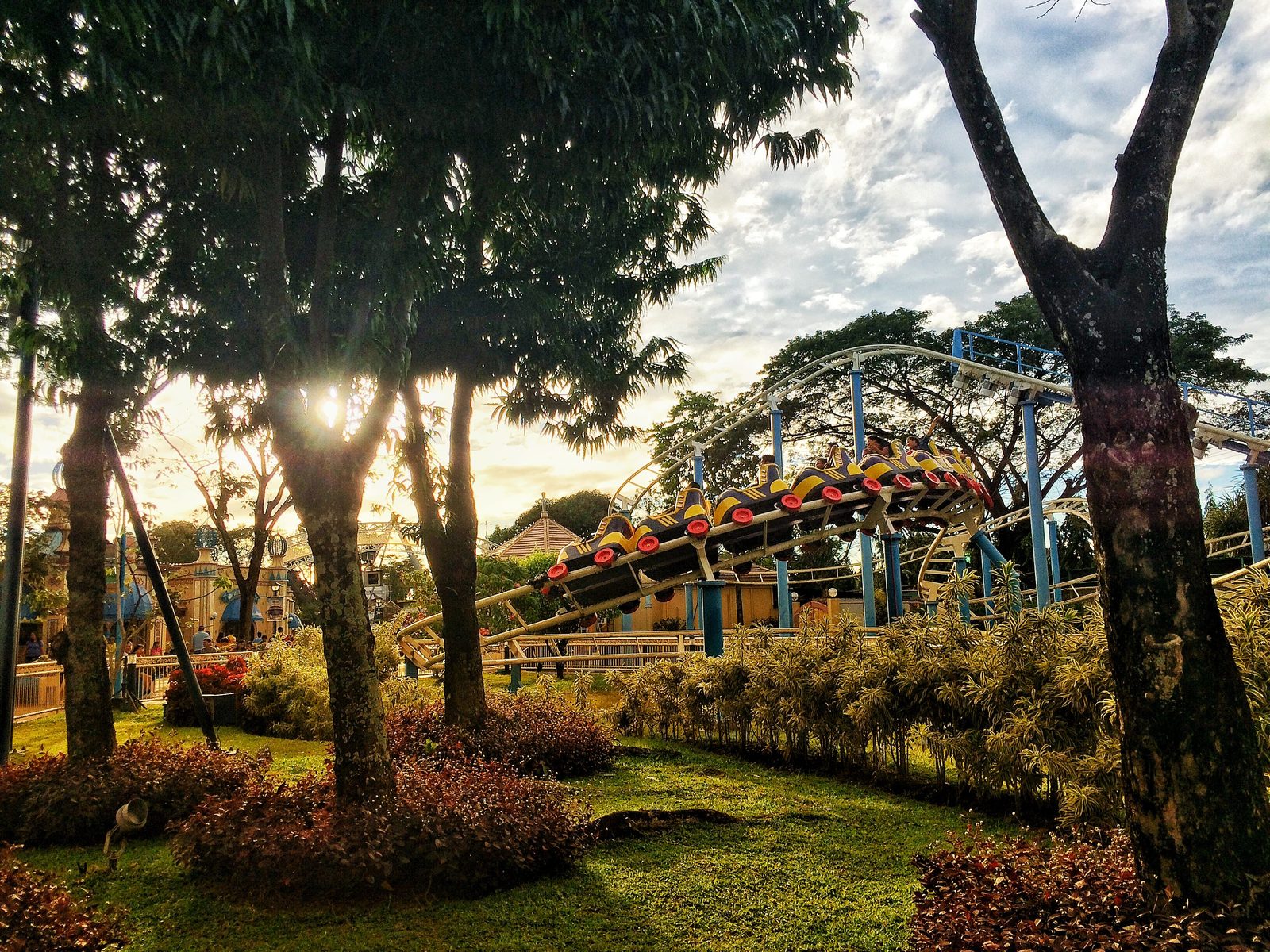 Roller coaster under a bright sky