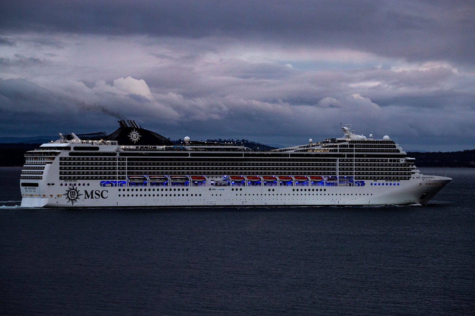 Cruise ship under dramatic sky