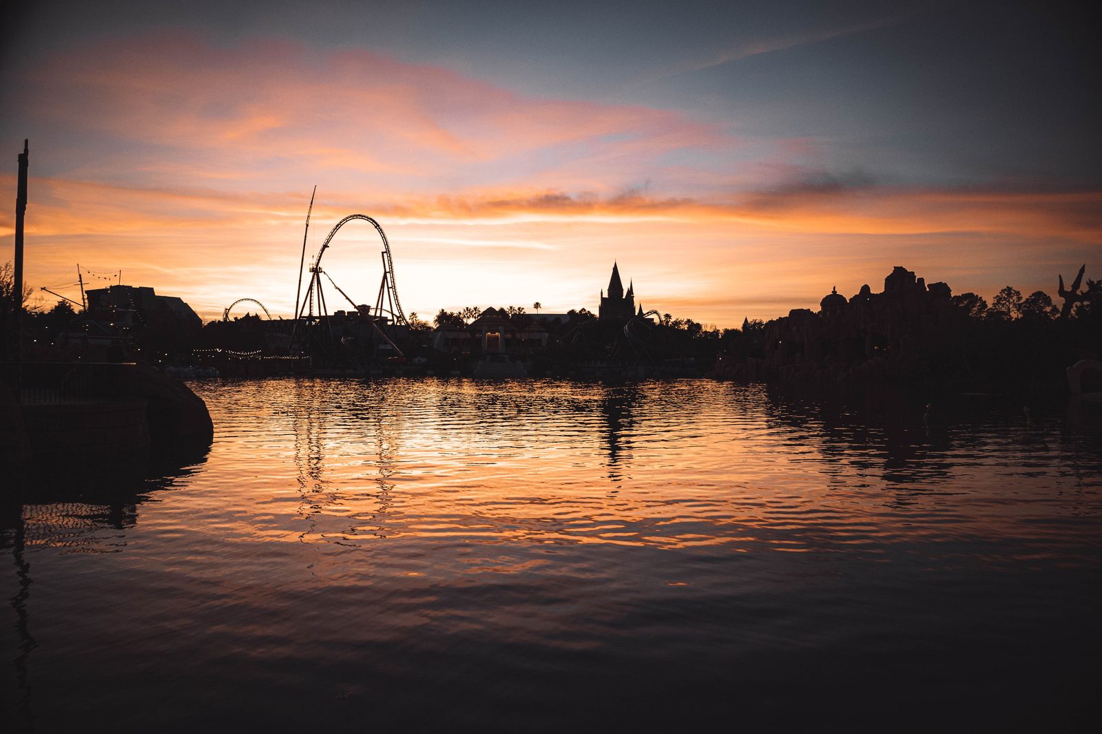 Orlando skyline with roller coaster at sunset
